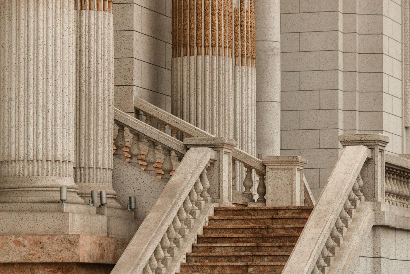 Stone steps, balustrades and fluted columns of a classical courthouse